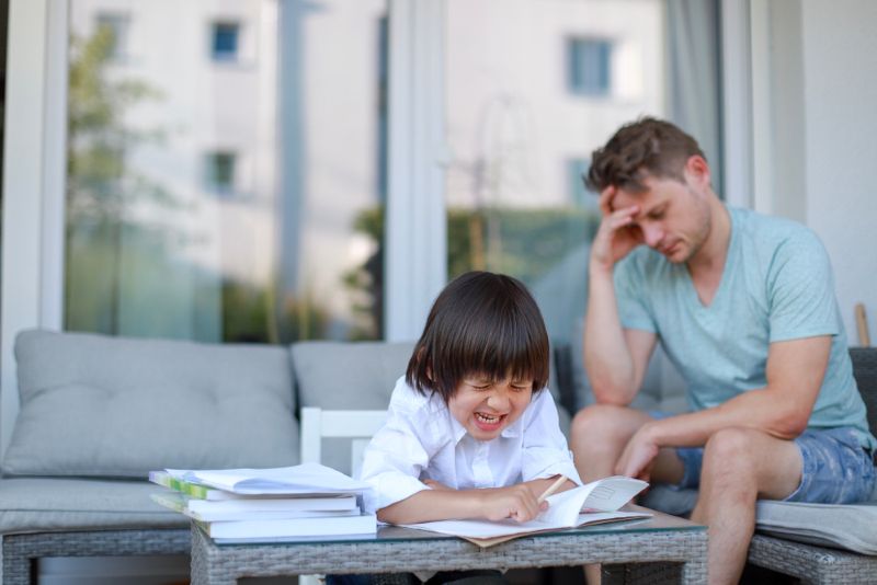 parent stressed over a crying child